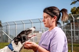 Katana with her trained greyhound in prison