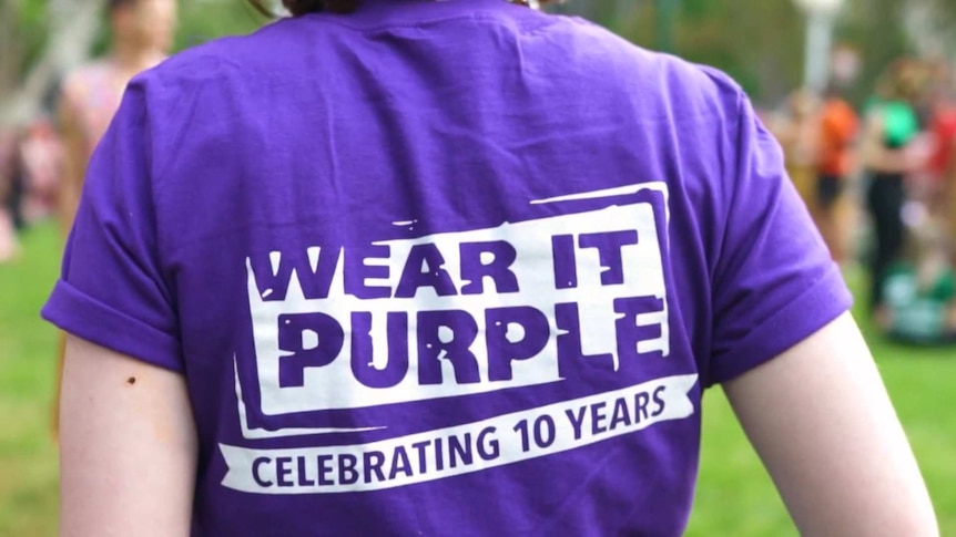The back of a Wear it Purple, Celebrating 10 Years tshirt someone is wearing.
