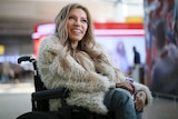 Russia's representative to the 2017 Eurovision Song Contest, Yulia Samoylova, poses in a wheelchair.
