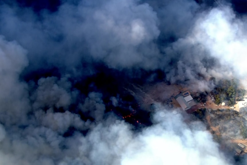 Smoke surrounding a rural property