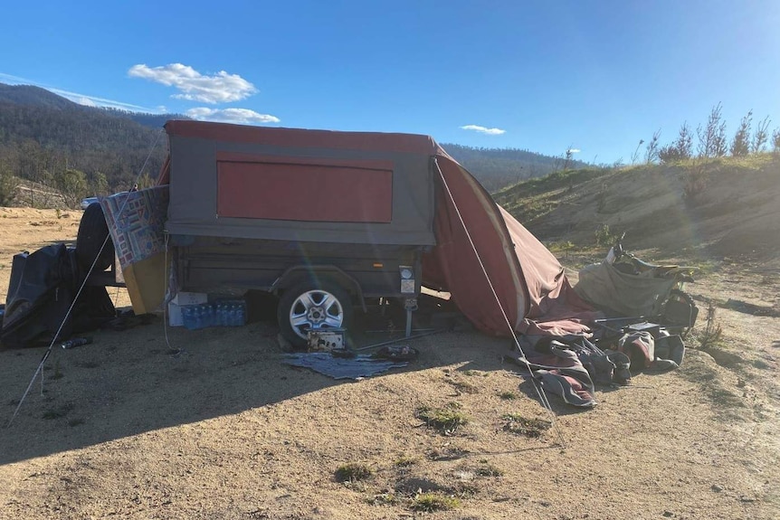 A tent on top of a hill.