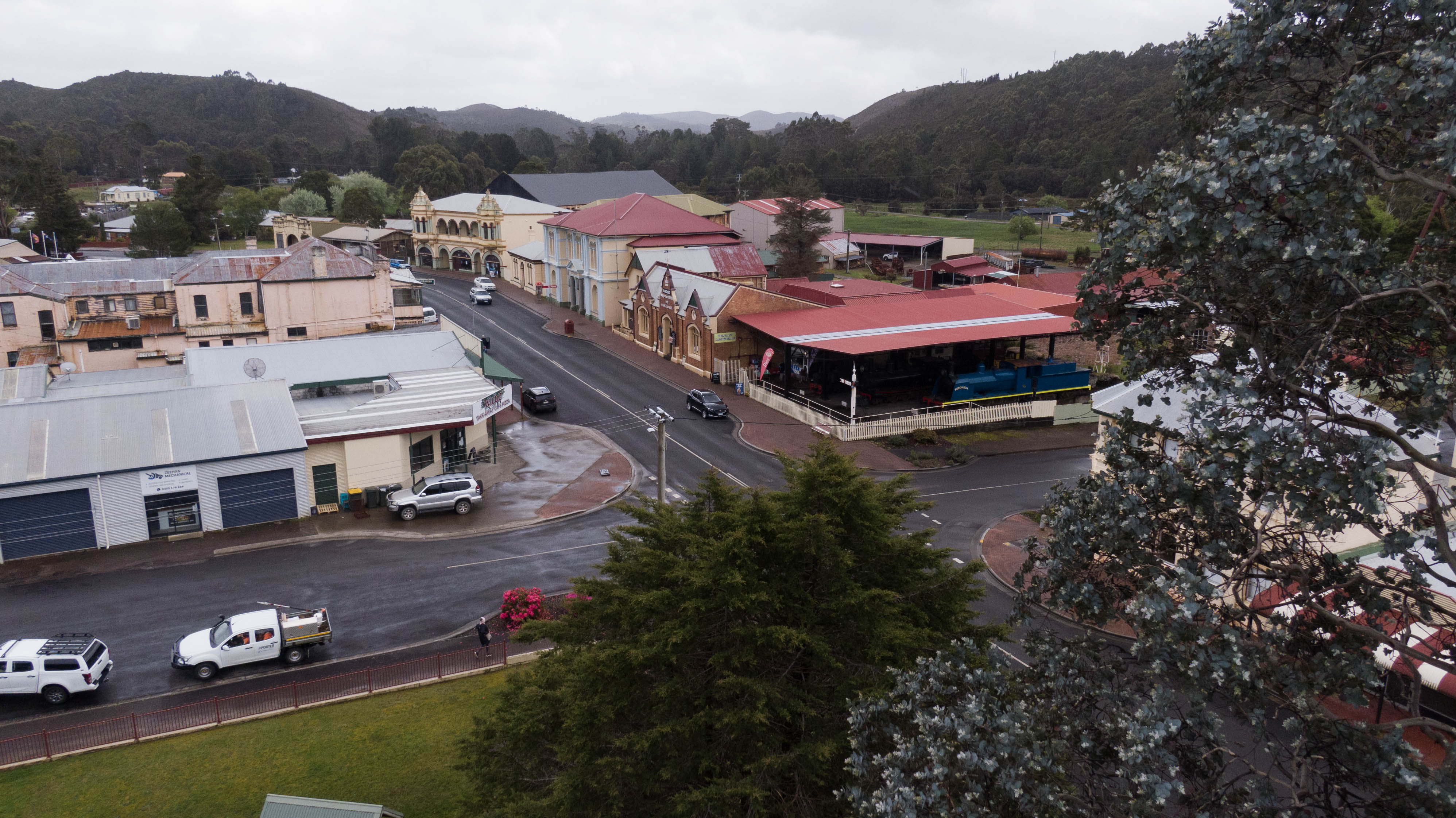 Drone image from above, of a small town with old buildings.