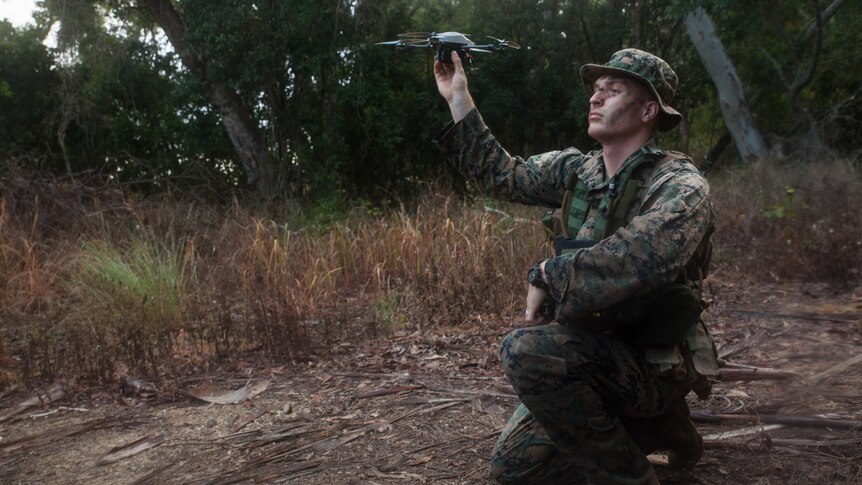 Marine prepares to launch a UAV