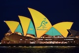 The Sydney Opera House lights up green and gold
