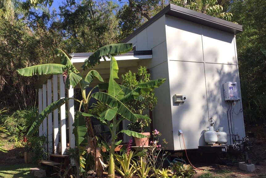 The house includes a self-composting toilet and demountable deck
