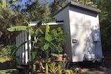 The house includes a self-composting toilet and demountable deck