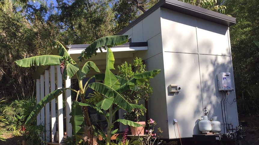 The house includes a self-composting toilet and demountable deck