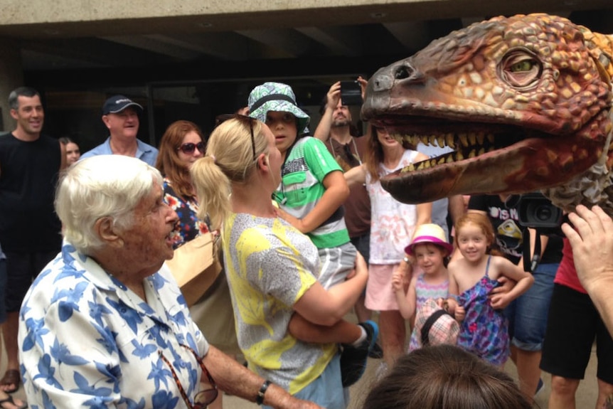 An Australovenator greets old and young at QPAC