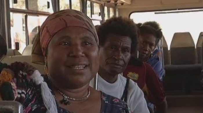 Papua New Guinea women inside a bus.