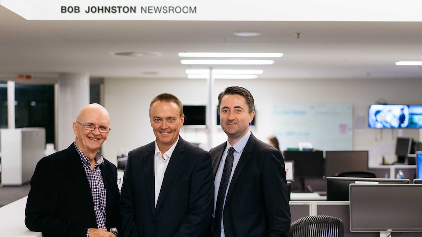 Bob Johnston in the newsroom named after him with current Managing Editor Stuart Watt and Director of News Gaven Morris