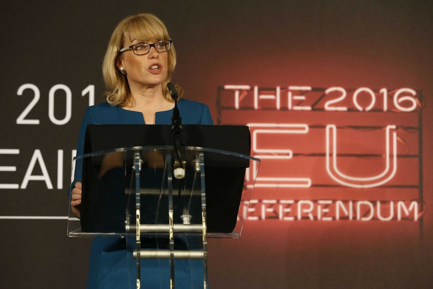 Jenny Watson speaks at the lectern