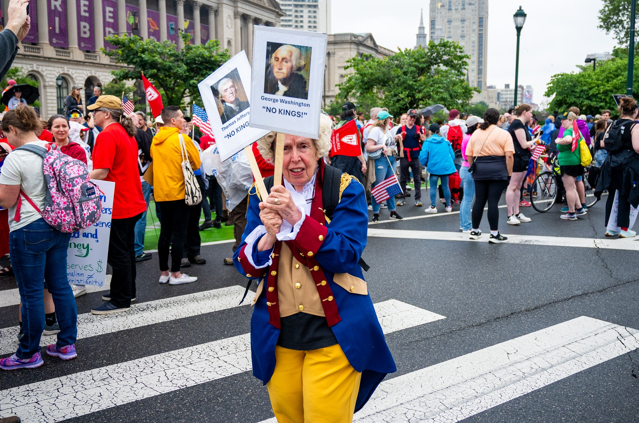 Protesters hold anti-Donald Trump signs in the streets of Philadelphia.