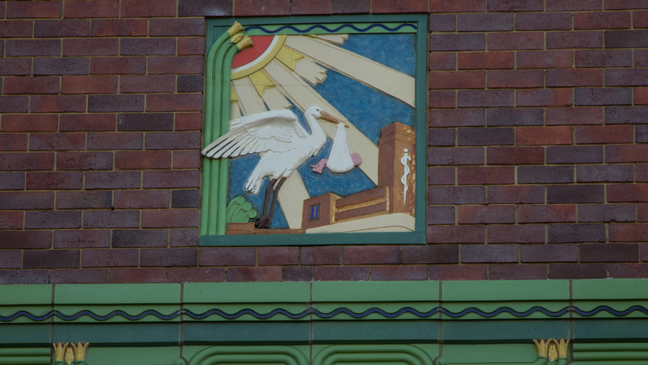 Stork motif above the entrance to the King Edward Memorial Hospital for Women