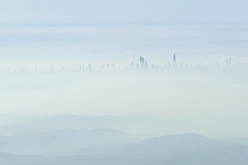 Bushfire smoke haze over the Gold Coast hinterland, looking toward a hazy city skyline