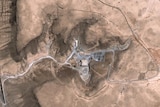 Satellite images, taken August 5, 2007 (Top) and October 24, 2007 (Bottom), show a suspected nuclear