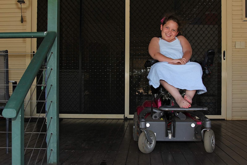 A photo of eight-year-old Felicity Brown on her front deck.