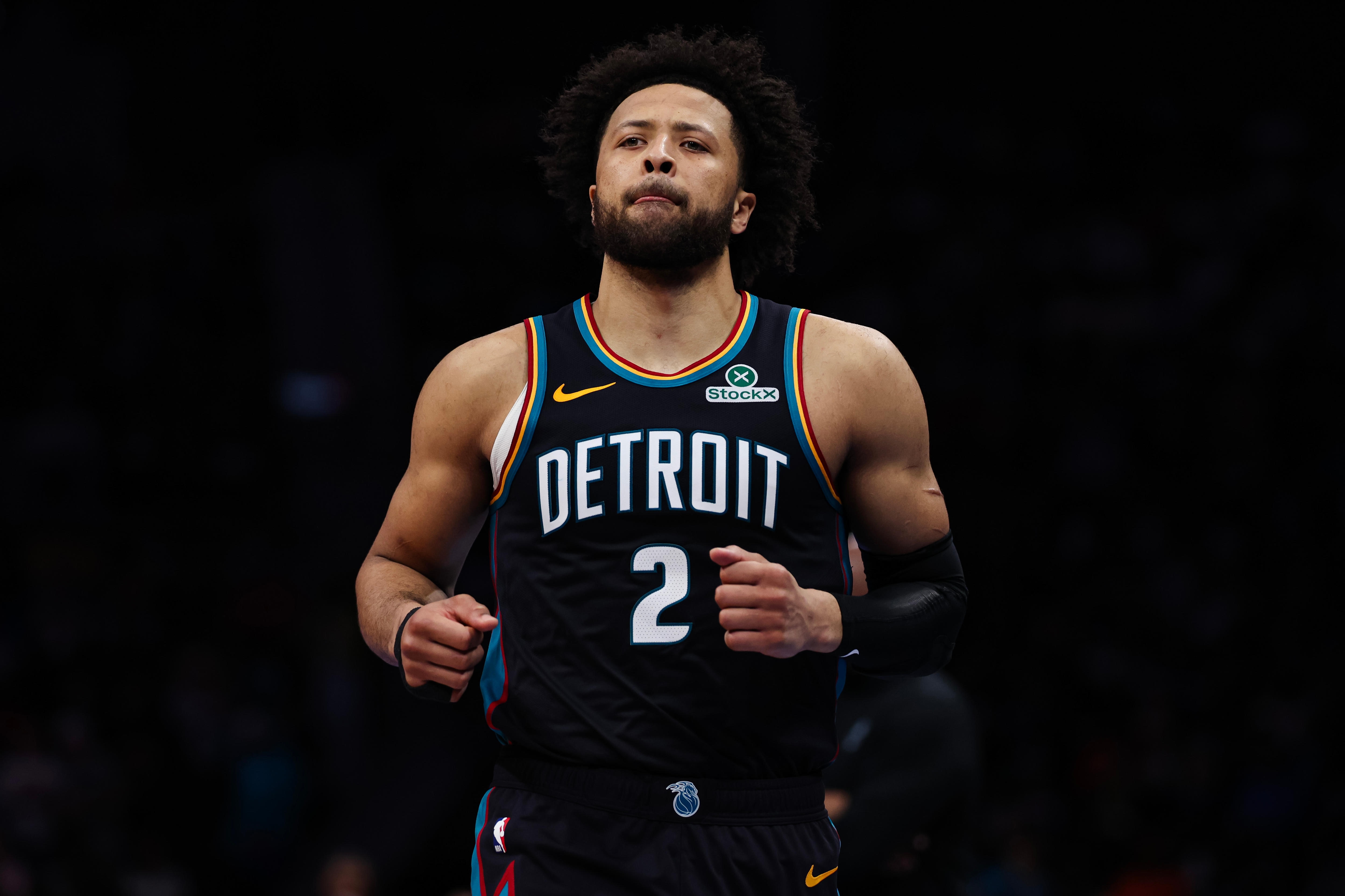 Cade Cunningham wearing a Detroit Pistons jersey