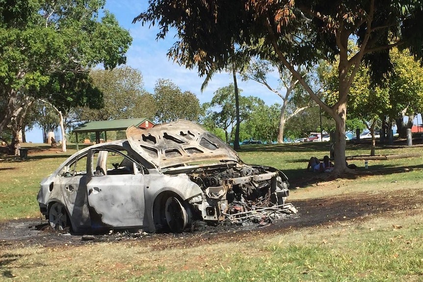 A burnt car in a Broome park.