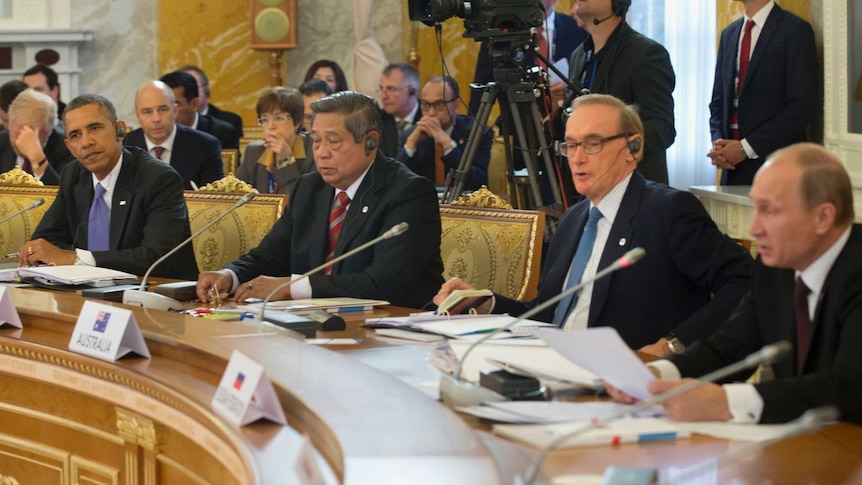 Barack Obama, Susilo Bambang Yudhoyono and Bob Carr listen to Vladimir Putin speak at the G20 summit in St Petersburg.