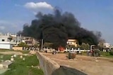 Buildings burn in Syrian protests