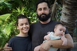 A portrait of prospective first homebuyers Leah and Darren and their baby in Darwin.