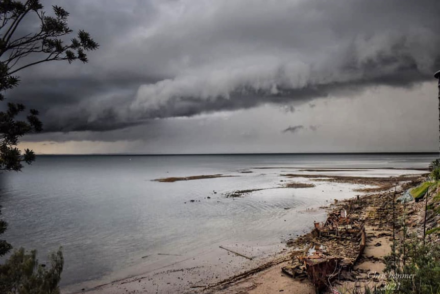 Storm clouds loom at Woody Point, north of Brisbane.