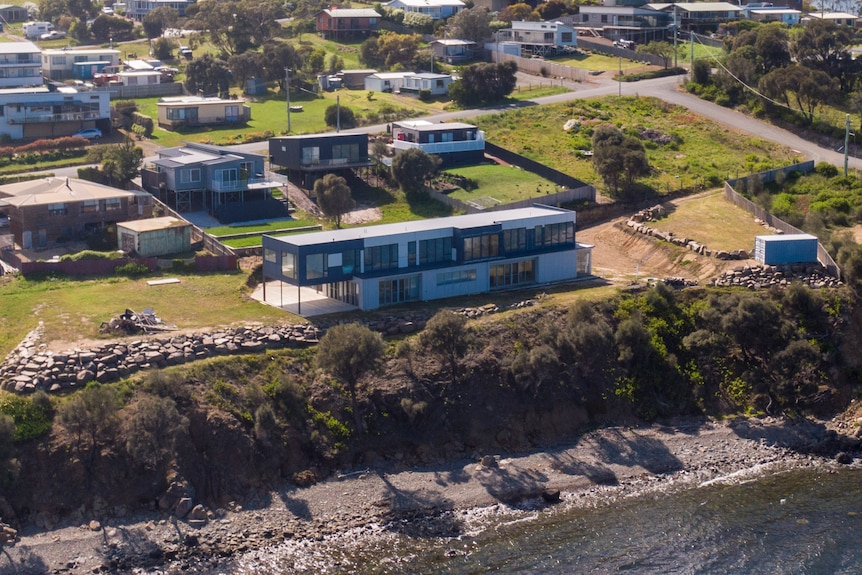 An unfinished home on the waterfront.