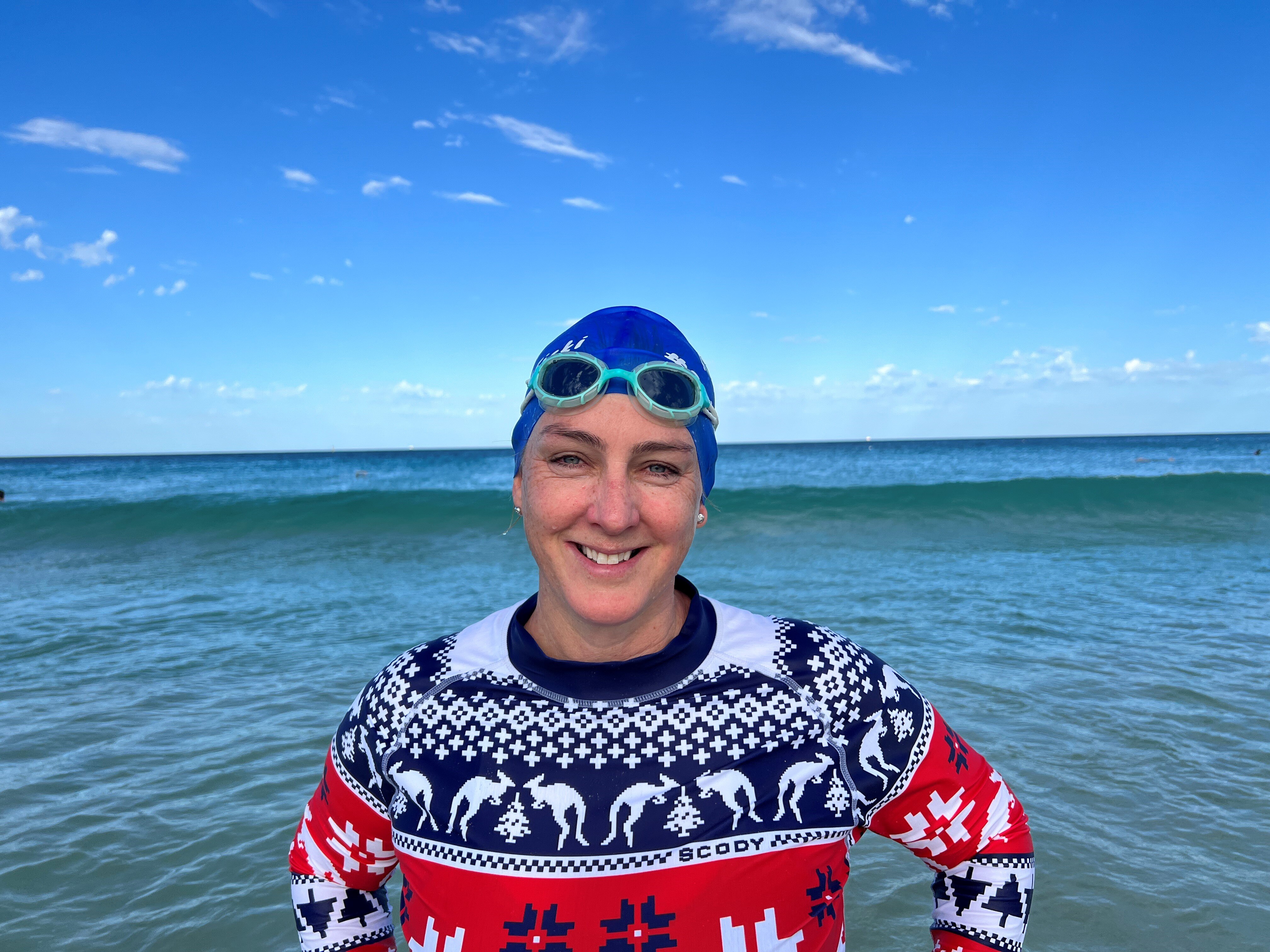 swimmer with cap and goggles 