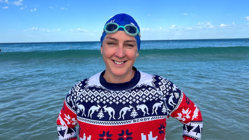 swimmer with cap and goggles 