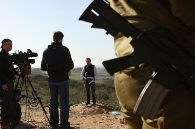 File photo: Journalist reporting on the Gaza border (Getty Images: Spencer Platt)