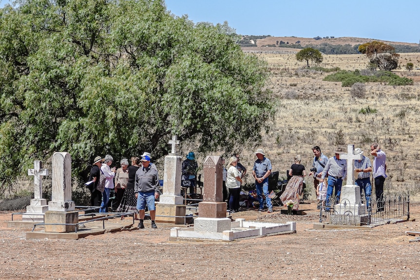 A crowd gathered at a regional cemetery.