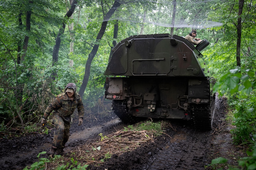 A Ukrainian army, German self-propelled Panzerhaubitze 2000, artillery drives to its position.