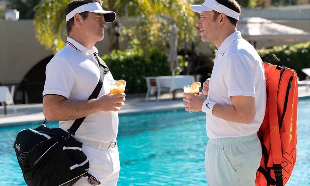 Nick Offerman (left) as Kenneth Griffins and Seth Rogan as Gabe Plotkin in Dumb Money.