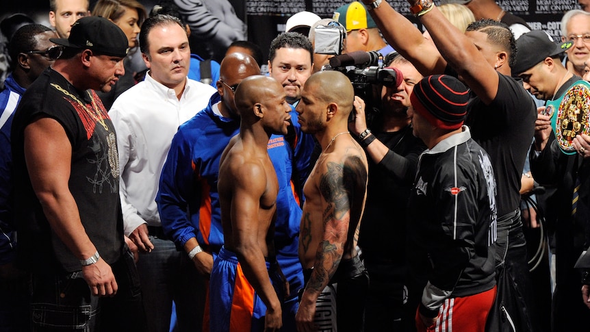 Mayweather and Cotto at weigh-in