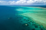 The Great Barrier Reef as seen from above on a stunning day.