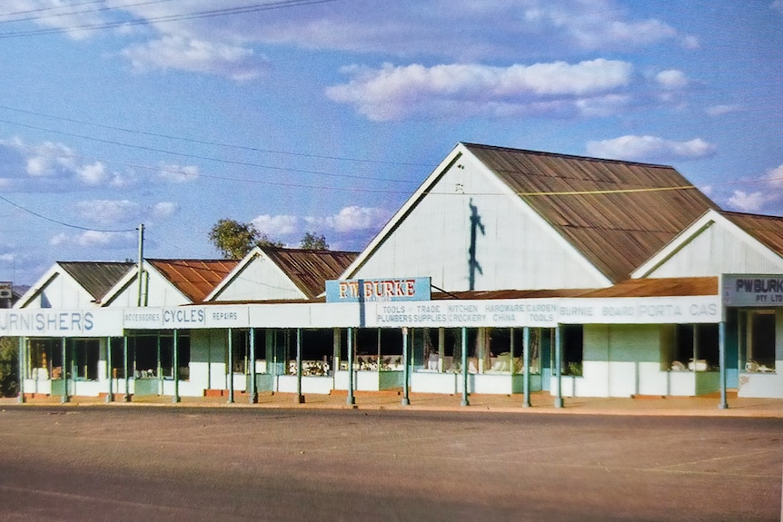 An old photograph of a hardware store with the sign 'P.W Burke' on the front