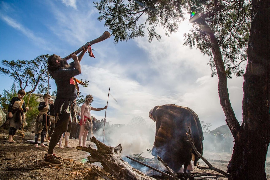 Aboriginal people conducting a traditional ceremony in the You Yangs near Geelong.