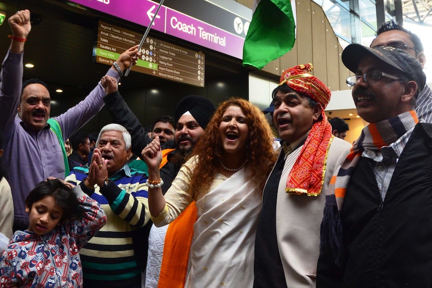 Monica and Rakesh Raizada (centre), part of the crowd waiting to board the Modi Express, November 16 2014.