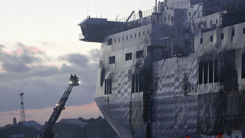 Emergency officials begin inspection of fire-destroyed Italian car ferry