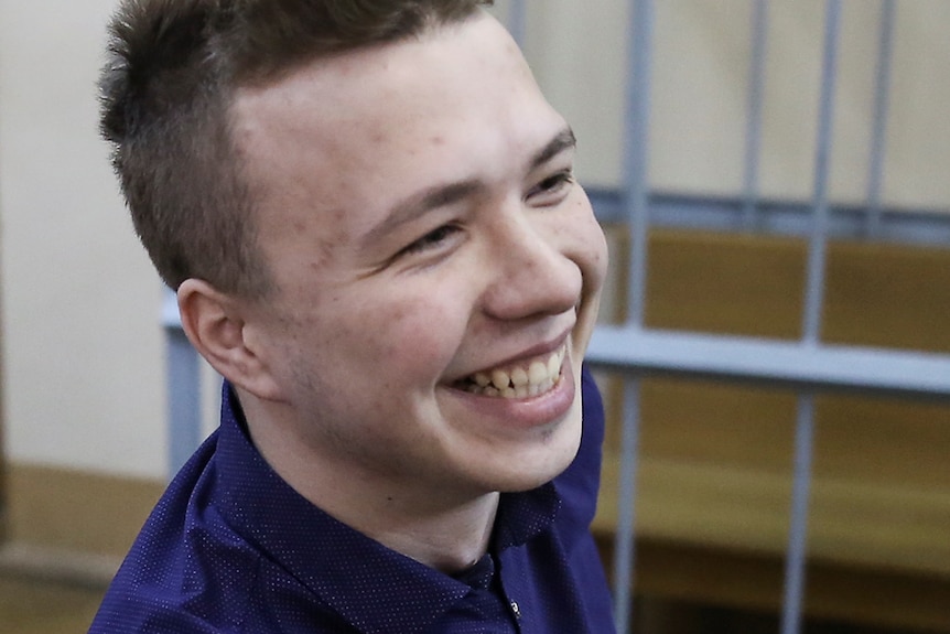 belarusian dissident roman protasevich sits in a minsk jail