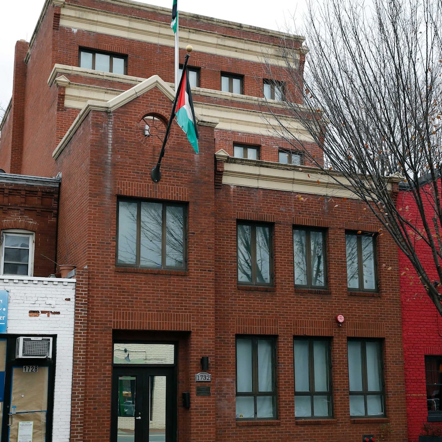 A flag flies at the front of Washington office of the Palestine Liberation Organisation