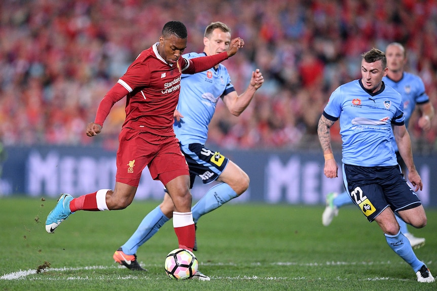 Liverpool's Daniel Sturridge lines up a shot against Sydney FC.