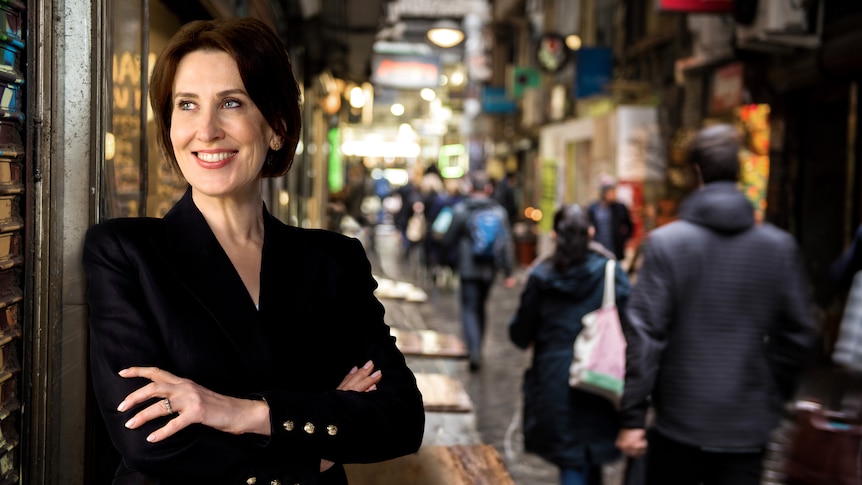 Virginia Trioli in one of Melbourne's colourful laneways.