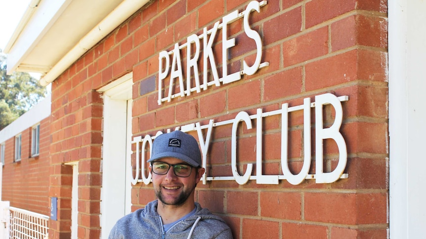 Michael Hackett stands outside Parkes Jockey Club.