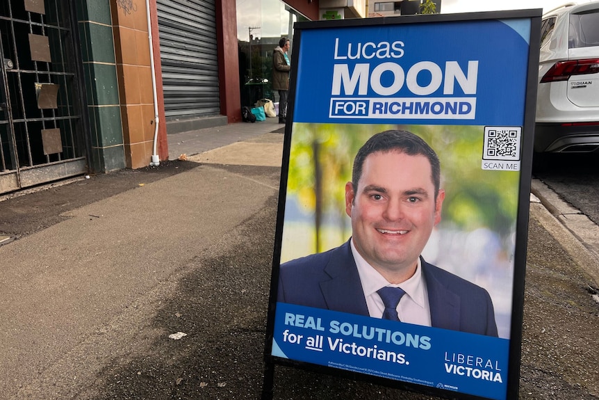 A blue poster on the pavement reads 'Lucas Moon for Richmond'.