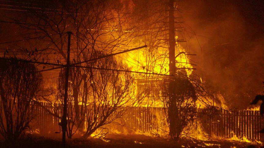 Flames engulf fence and shed in Kambah