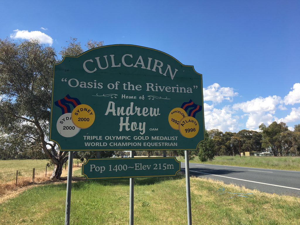 a sign at the entrance to a town