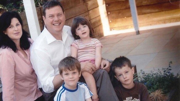 Campaign photo of Tim Nicholls and wife Mary with their three children, Kate, Jeremy, and Duncan.