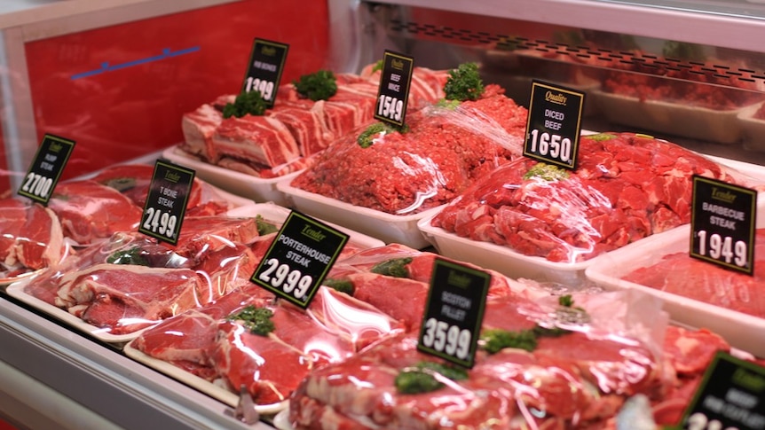 Meat on display in a butcher shop.