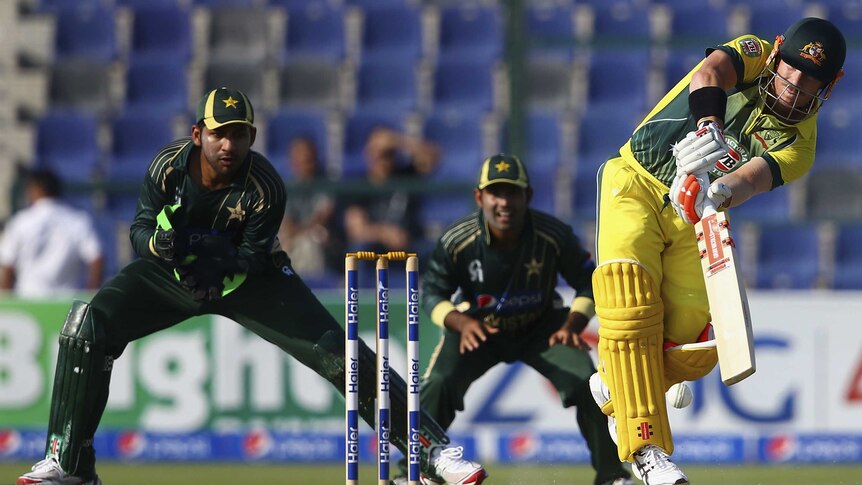 Warner plays a shot against Pakistan